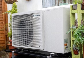 A white air conditioner outside - AI-generated content may be incorrect.
